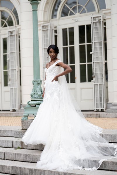 bride on her own exterior hotel pose