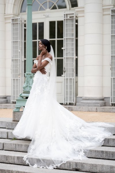 bride on her own exterior hotel pose