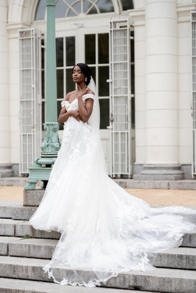 bride on her own exterior hotel pose