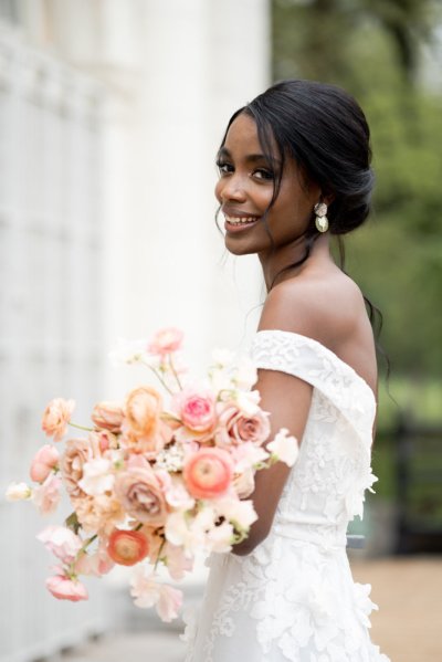 bride pink roses earrings bouquet flowers smiling