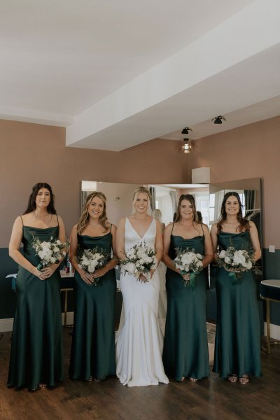 Bridesmaids and bride