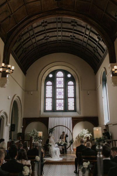 Ceremony church setting guests bride groom