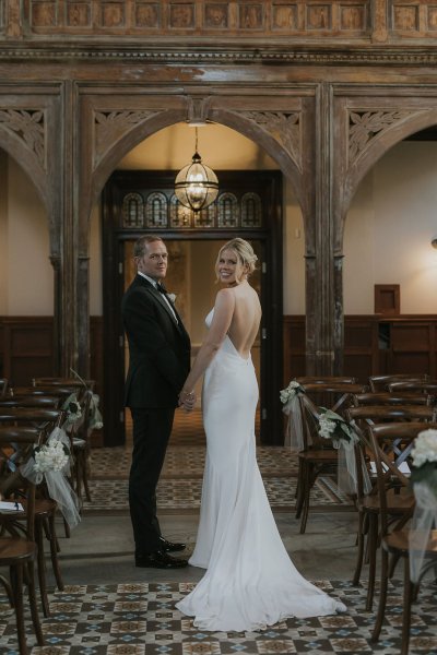 Photography bride groom look behind