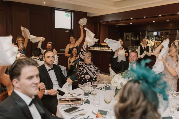 Bride in dining room with guests