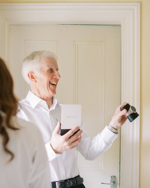 father with gift of watch