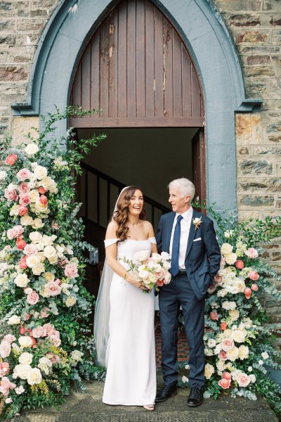 bride and father outside church