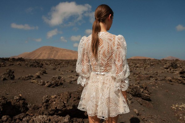 Sunny lace short bridal dress mountains scene