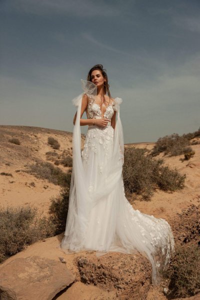 Model evening shot bridal gown bride beach cliffs