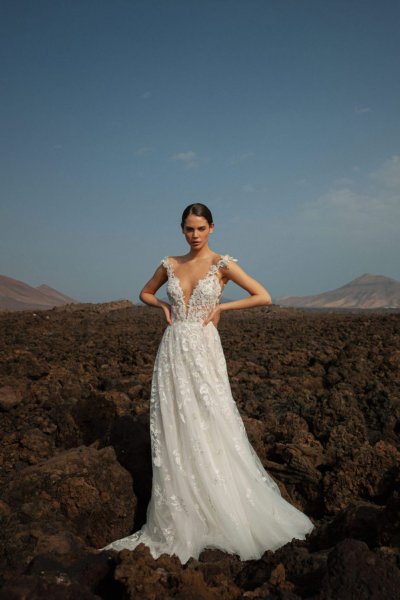 Long dress model bridal gown sunny beach