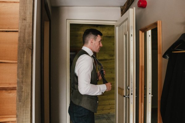 groom suit tie getting ready