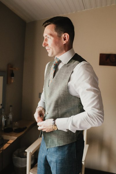 groom suit tie getting ready