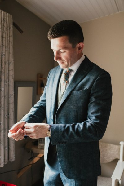 groom suit tie getting ready