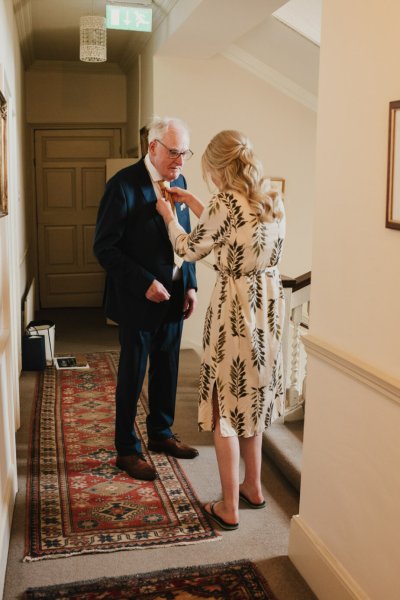 Daughter father getting ready bridesmaid