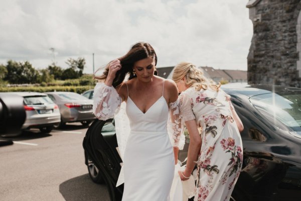 Bride entering wedding venue