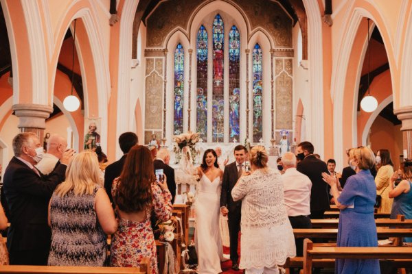 Bride and groom in church alter