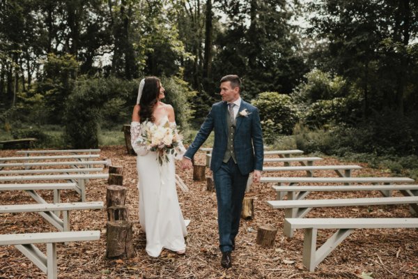 Bride groom holding hands