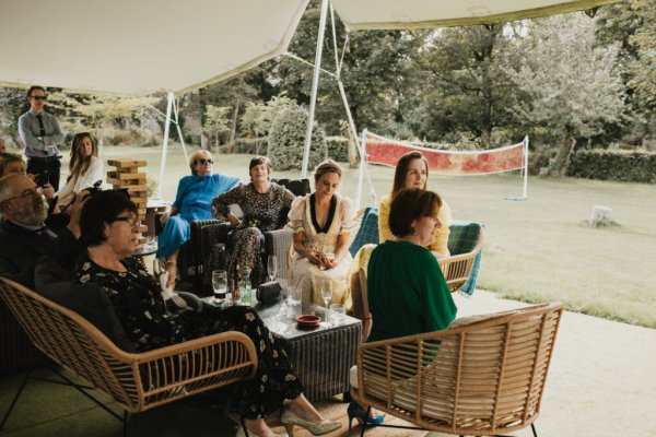 Guests sitting down listening to speeches