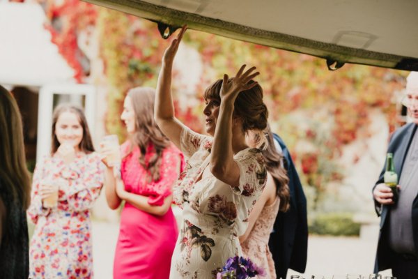 Guests celebrating couple