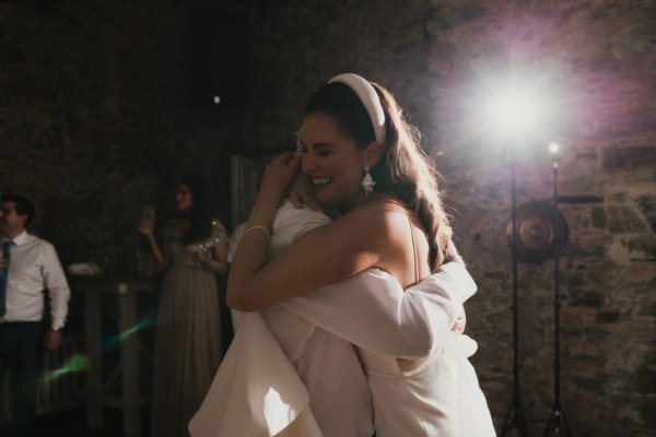 Guests smiling bride