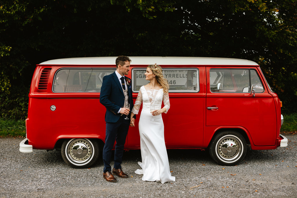 Red wedding car van bride groom