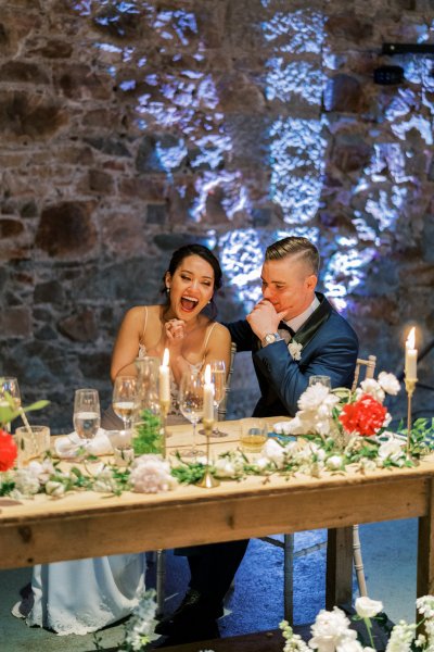 Bride groom speeches speech candles red roses cheers champagne prosecco glasses