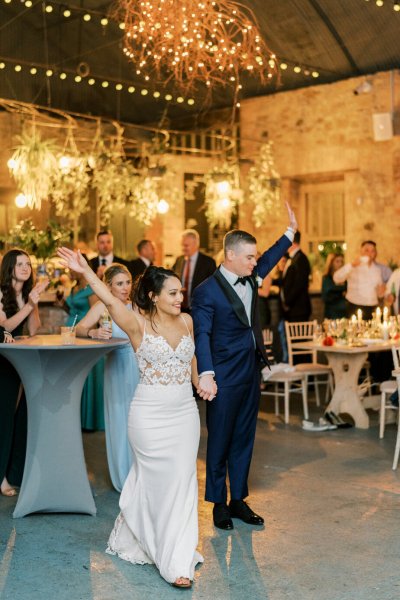 Guitarist wedding band play as bride and groom dance