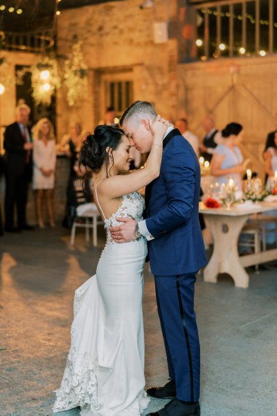 Guitarist wedding band play as bride and groom dance