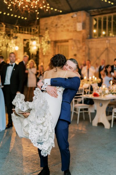 Guitarist wedding band play as bride and groom dance