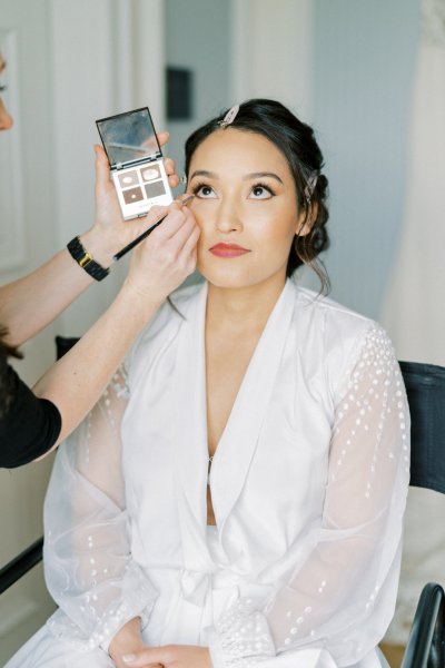 Bride getting makeup done MUA