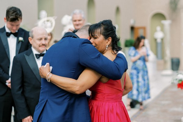 Guests hug bride groom ceremony