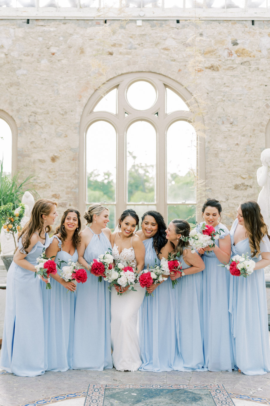 Blue bridesmaids dresses bride rose bouquet flowers