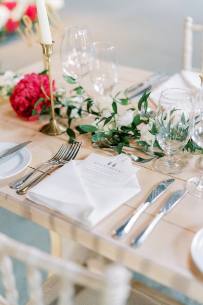 Interior ceremony ceremonial room dining roses red white flowers candle chairs