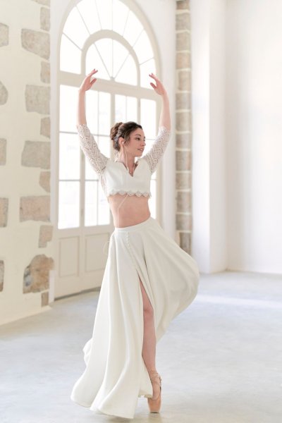 Bride wedding dress dancing in studio