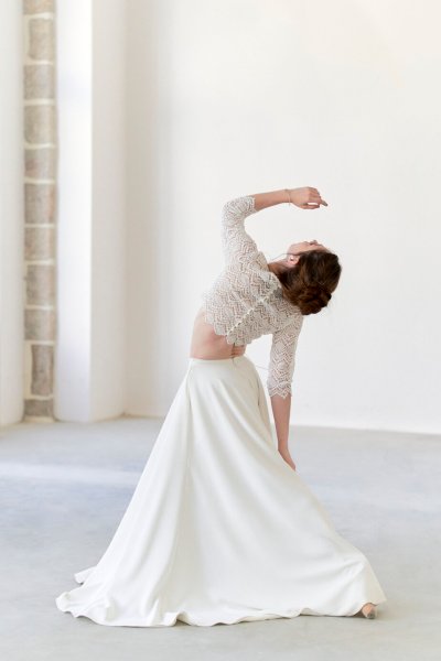 Bride wedding dress dancing in studio