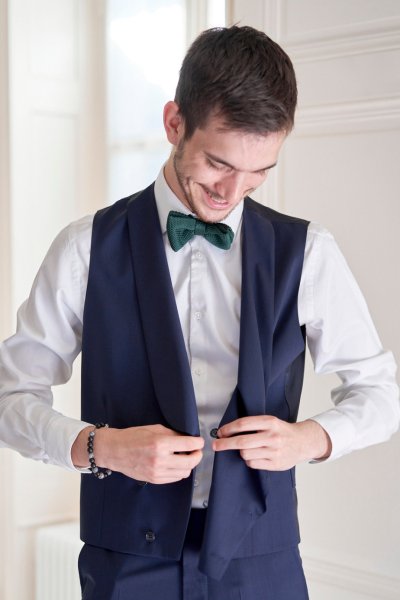 Groom blue suit detail bow and ties