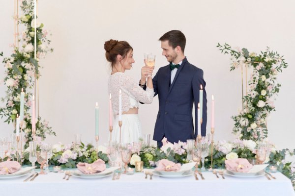 Bride groom dancing table pink flowers candles