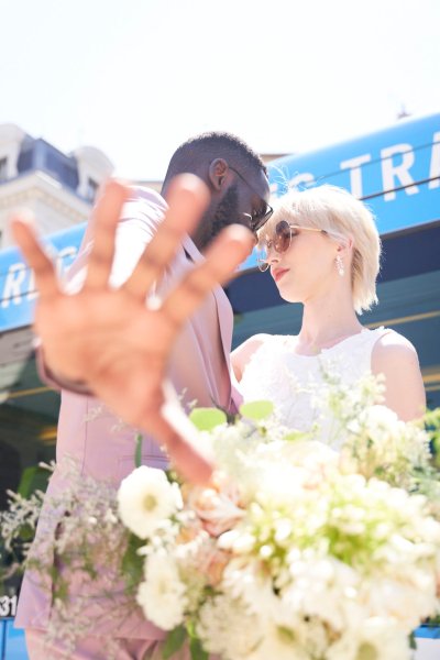 Bride groom bouquet of flowers sunglasses