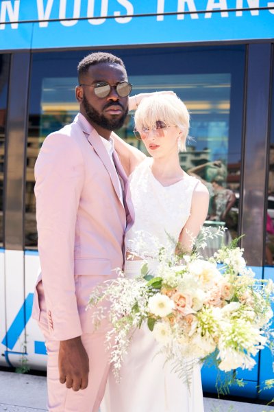 Bride groom bouquet of flowers sunglasses