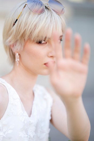 Bride hand short blonde hair