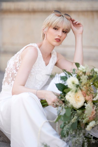 Bride hand short blonde hair flowers bouquet