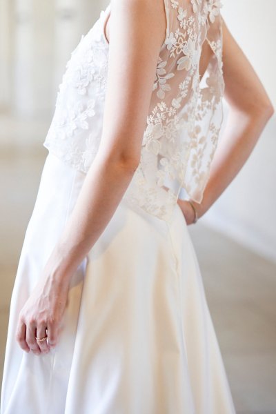 Detail of dress from behind bride