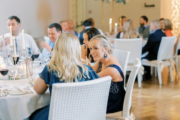 Guests sit in dining room