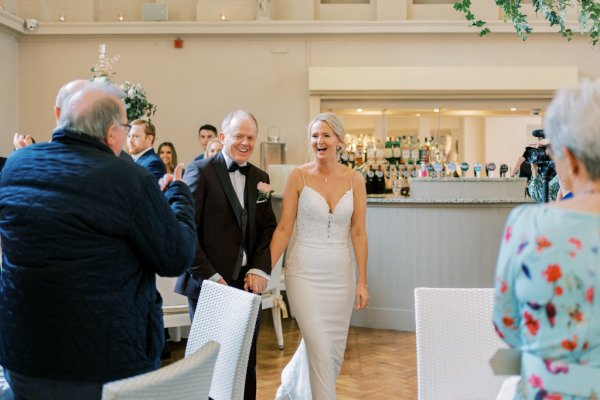 Bride and groom with guests