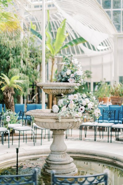 Blue wedding ceremony decor fountain tress flowers