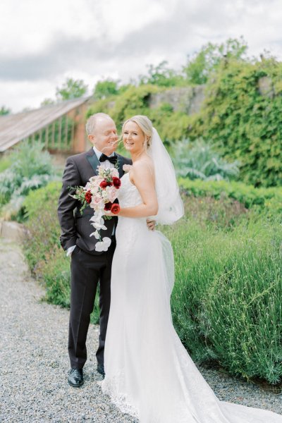 Bride groom together in garden