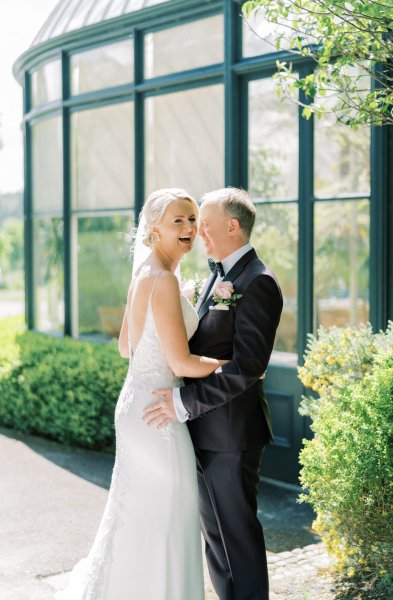 Bride groom garden park roses flower bouquet veil smiling sunshine