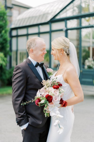 Bride groom garden park roses flower bouquet veil