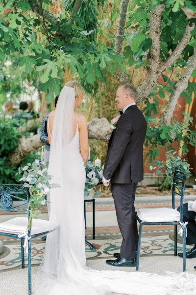 Bride groom stand at wedding ceremony vows