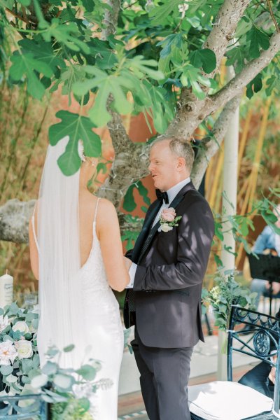 Bride groom stand at wedding ceremony vows