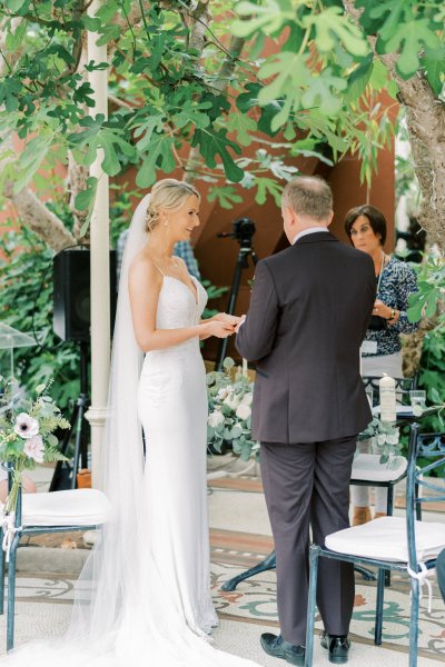 Bride groom stand at wedding ceremony vows